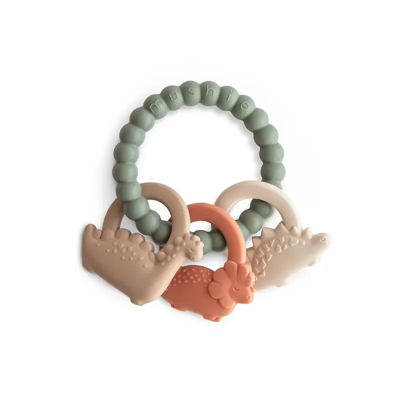 Kampanjpris Mushie Silikonbitring för barn på ett Dino-hjul