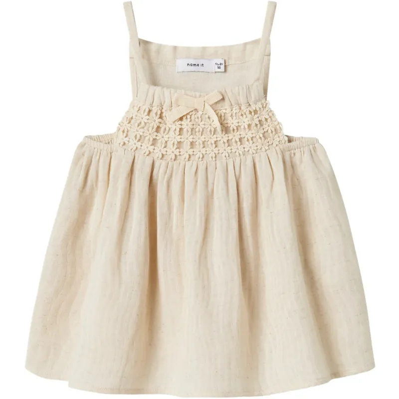 Köp online Name It Bleached Sand Jatti Rem Topp